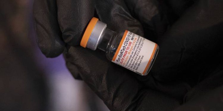 A vial of the Pfizer-BioNTech COVID-19 vaccine for children five to 12 years old at the Viral Solutions vaccination and testing site in Decatur, Ga., on the first day COVID-19 vaccinations were available for children from 5 to 12 on Wednesday, Nov. 3, 2021. (AP Photo/Ben Gray)