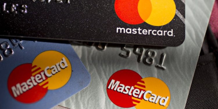Mastercard Inc. credit cards are arranged for a photograph in Arlington, Virginia, U.S. on Monday, April 29, 2019. Photographer: Andrew Harrer/Bloomberg