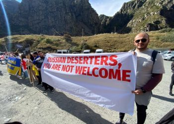 ფოტო ლარსიდან, რომელმაც მსოფლიო მოიარა – “ასე აღმოვჩნდი დიდი ბანერის ერთ მხარეს”