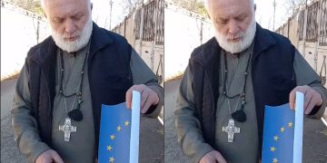 (ვიდეო)სასულიერო პირმა ევროკავშირის დროშას ცეცხლი წაუკიდა და დაწვა